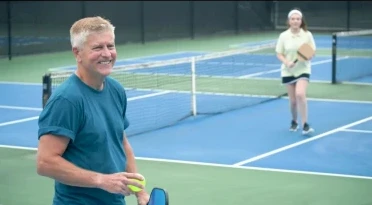 Man playing pickleball, active again after neuropathy care in Frederick, MD