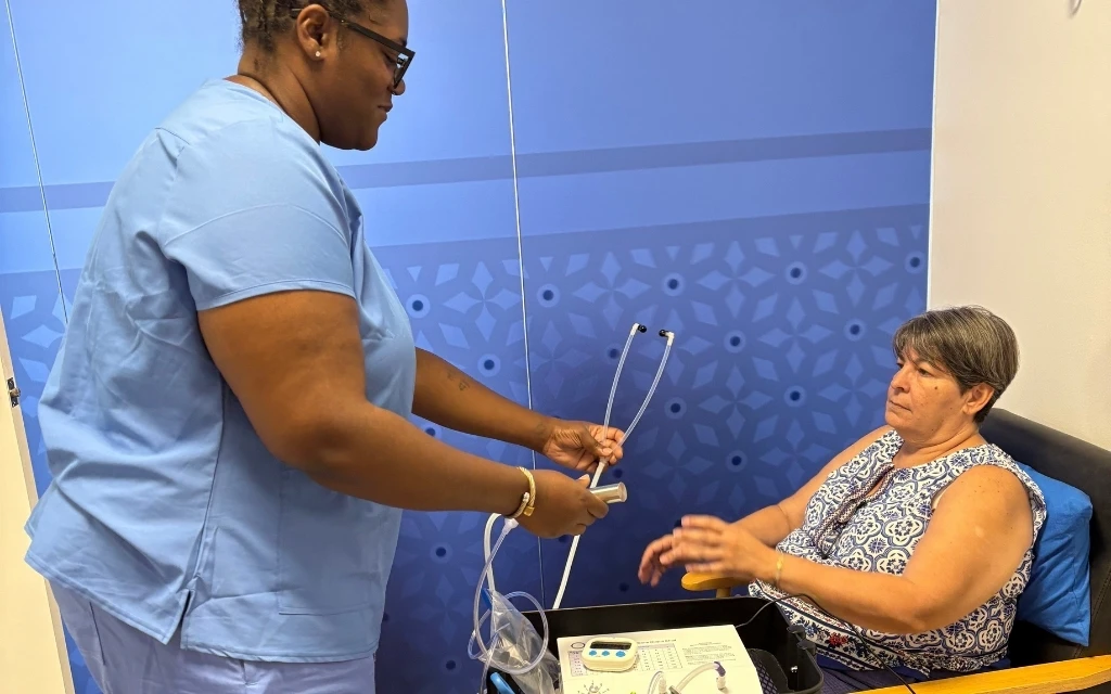 Patient receiving ozone therapy as part of an integrative wellness treatment at Acupuncture Medical Clinic of Maryland in Frederick, MD