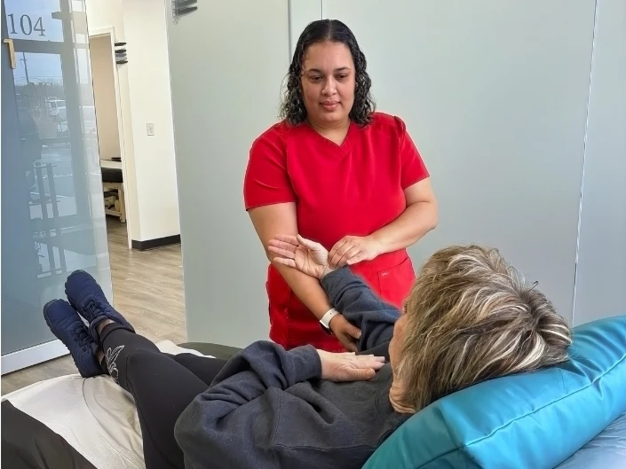 Older adult receiving personalized acupuncture care for pain and mobility support in Frederick, MD